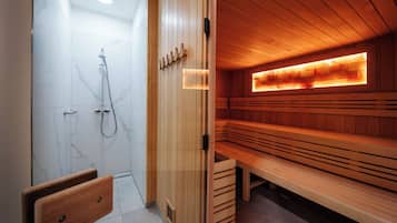 Un sauna, una bañera de hidromasaje