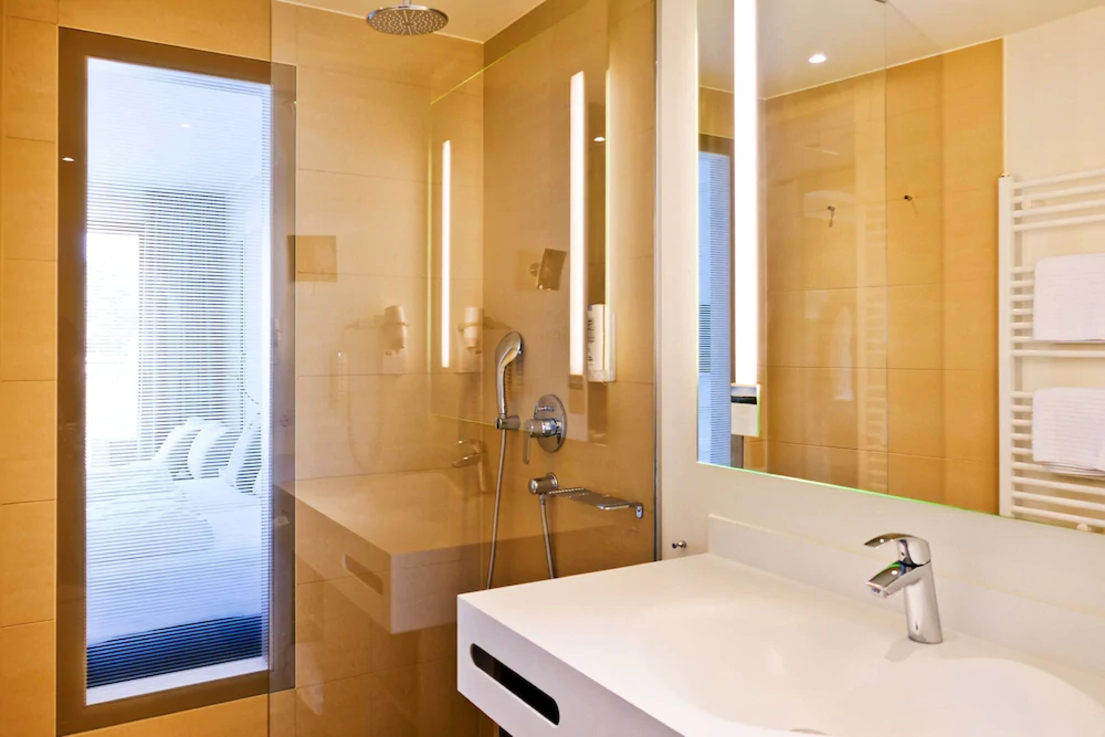 shower, hair dryer, bathrobes, towels