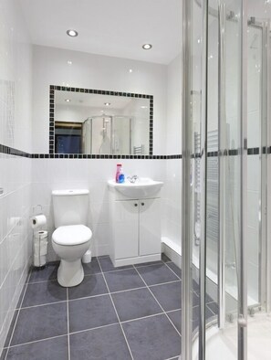 Shower, free toiletries, hair dryer, towels