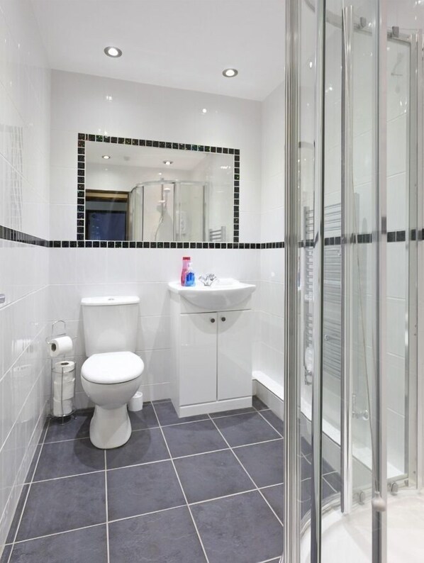 Shower, free toiletries, hair dryer, towels