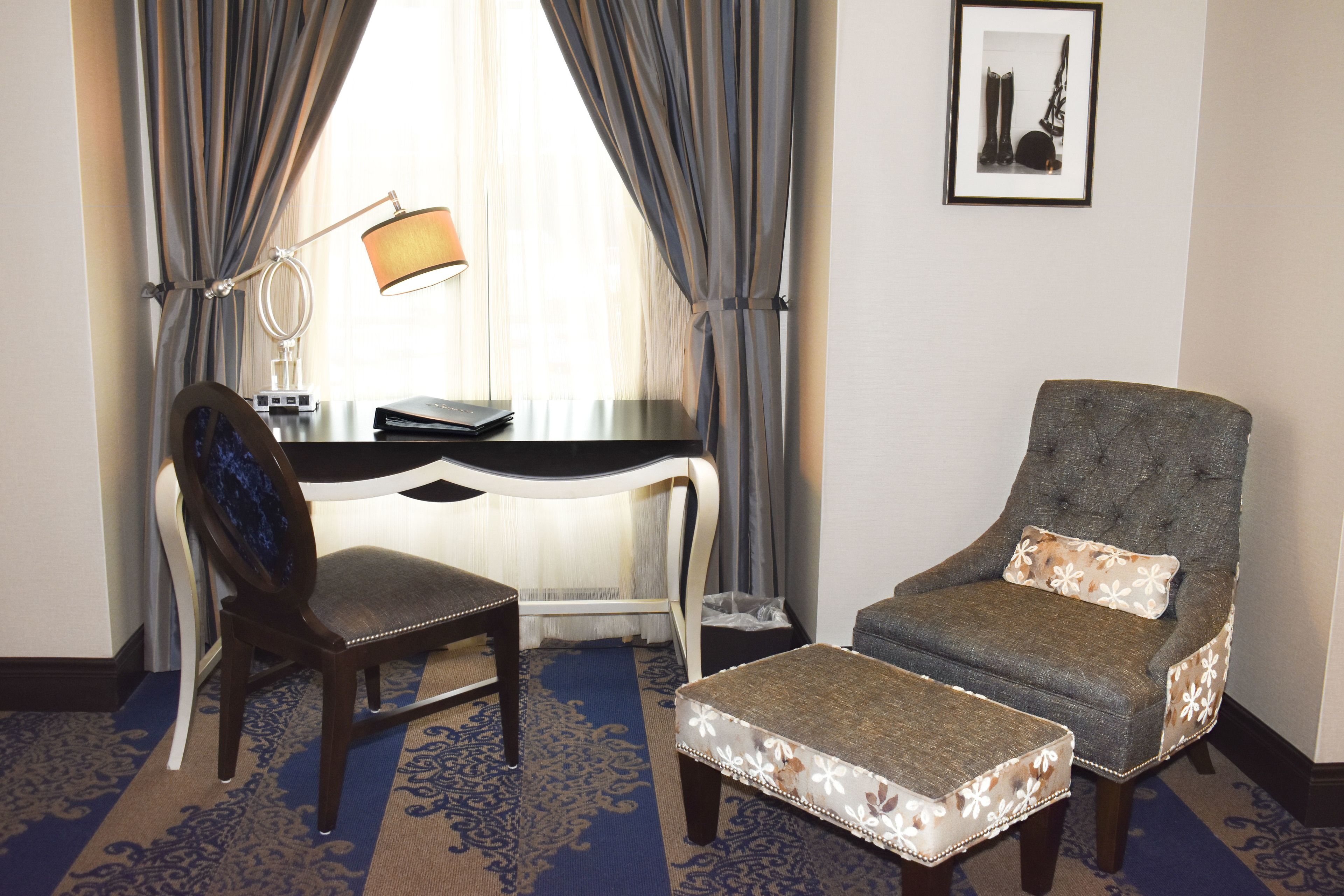 deluxe room, 1 king bed, non smoking | premium bedding, in-room safe, laptop workspace, blackout curtains