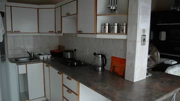 The upper deck- overlooking pool area | Private kitchenette
