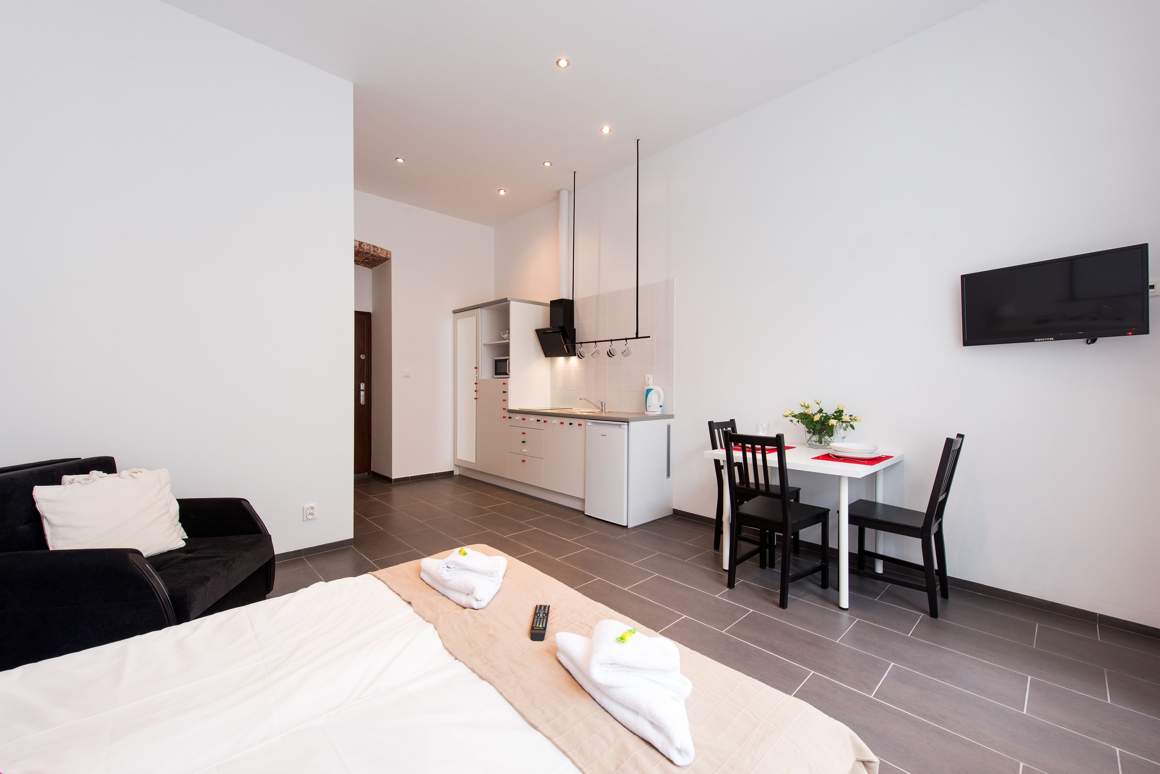 Family Studio Suite (2 pax + 1 pax) | Living area | Flat-screen TV