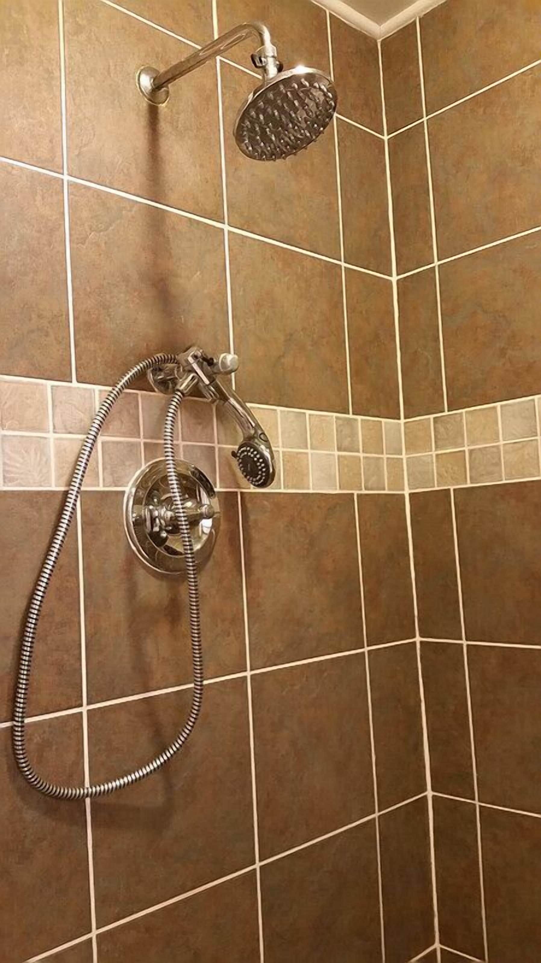 deluxe suite, 1 queen bed (historic inn ) | bathroom shower