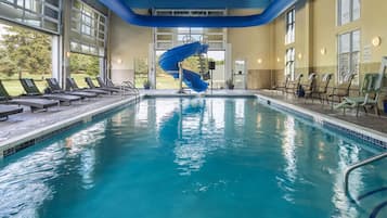 Indoor pool, open 8:00 AM to 11:00 PM, pool loungers