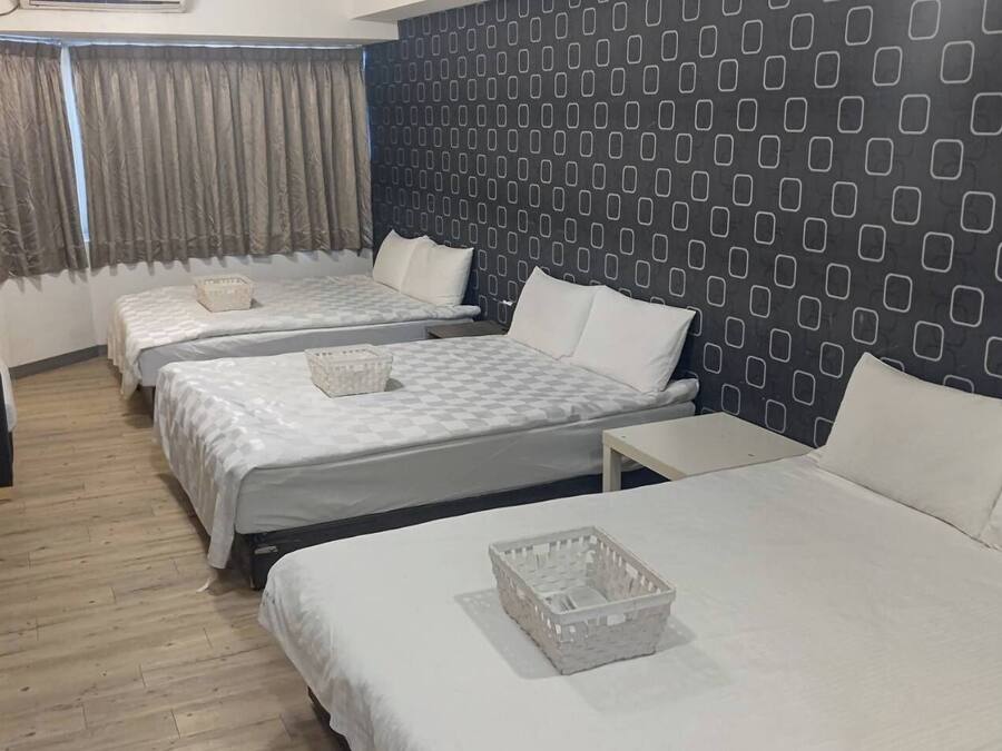 Standaard kamer (For 6 people) | Een kluis op de kamer, verduisterende gordijnen, geluiddichte muren