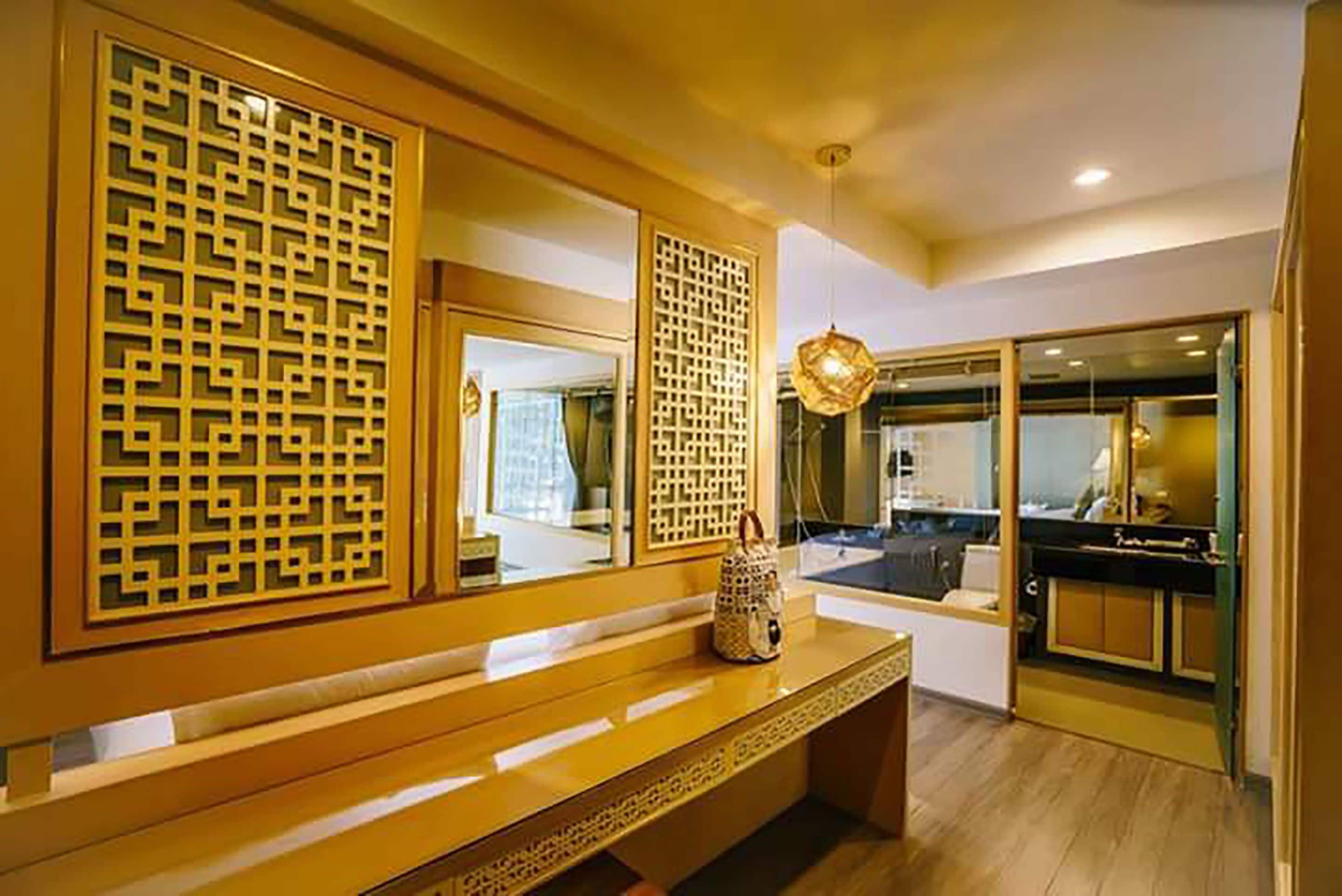 grand deluxe room | in-room safe, desk, blackout curtains, iron/ironing board