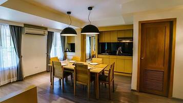 Penthouse | Private kitchenette | Fridge, electric kettle