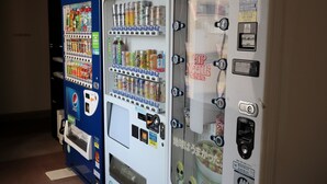 A row of vending machines with various beverages and snacks, including a Pepsi machine. - Kochi Green Hotel Harimayabashi (Kochi)