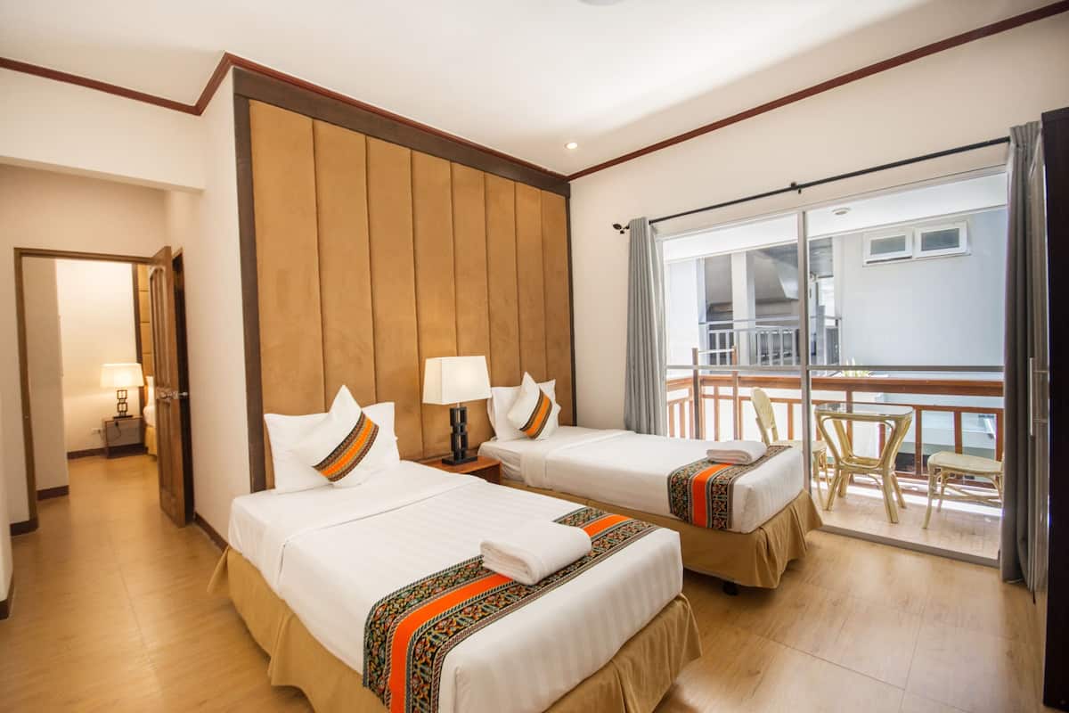 Family Room | 2 bedrooms, in-room safe, desk, bed sheets