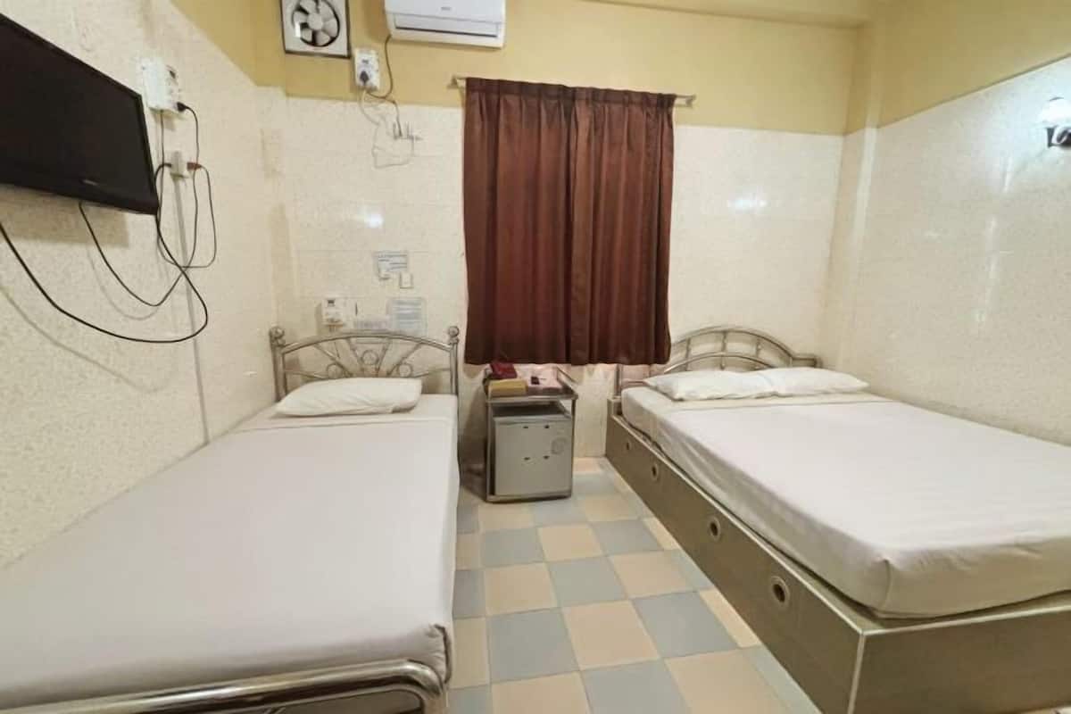 Minibar, desk, blackout curtains, rollaway beds