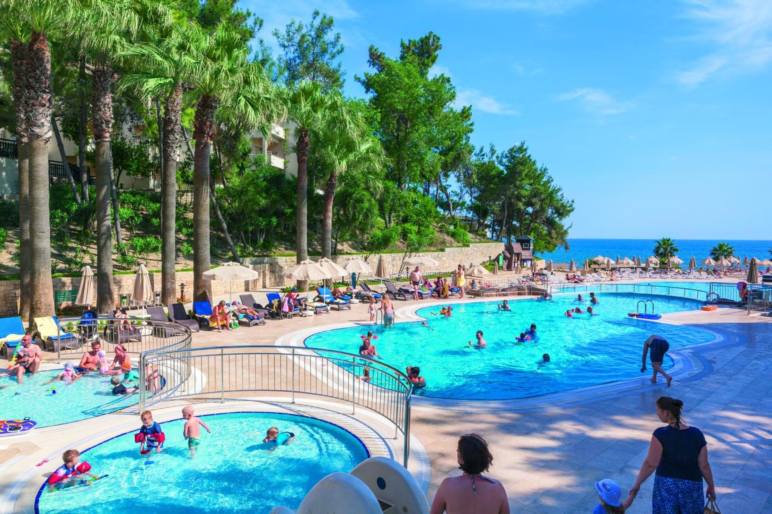 2 outdoor pools, pool umbrellas, sun loungers