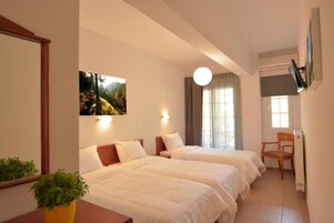 Roupas de cama premium, cortinas blackout, Wi-Fi de cortesia