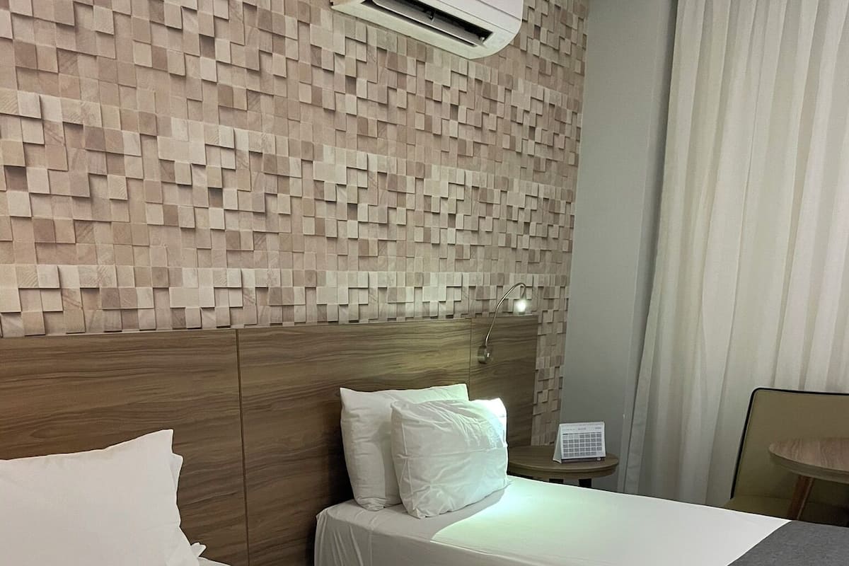 Deluxe Twin Room, Air conditioning, City View | Minibar, in-room safe, desk, blackout drapes