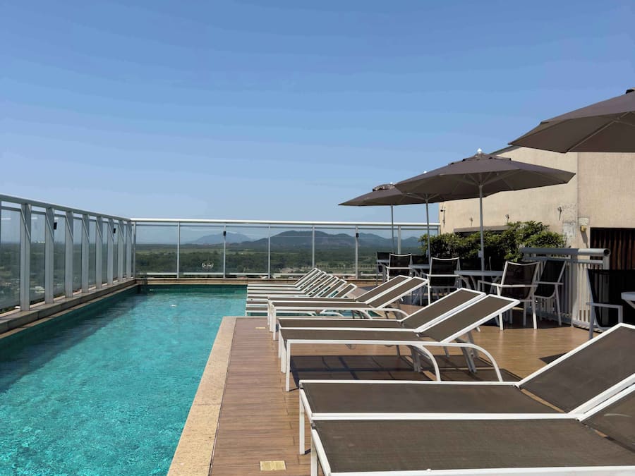 Outdoor pool, open 8:00 AM to 8:00 PM, pool umbrellas, sun loungers