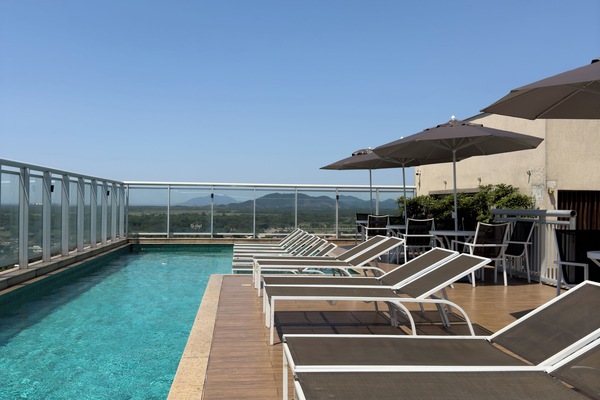 Outdoor pool, open 10:00 AM to 6:00 PM, pool umbrellas, pool loungers