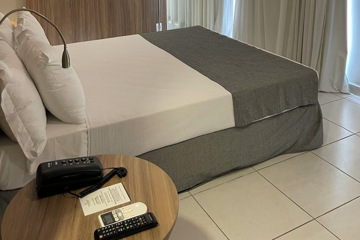 Deluxe Double Room, Air conditioning, City View | Minibar, in-room safe, desk, blackout drapes