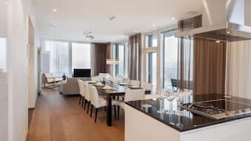 Comfort Penthouse, Balcony | Living area | Flat-screen TV