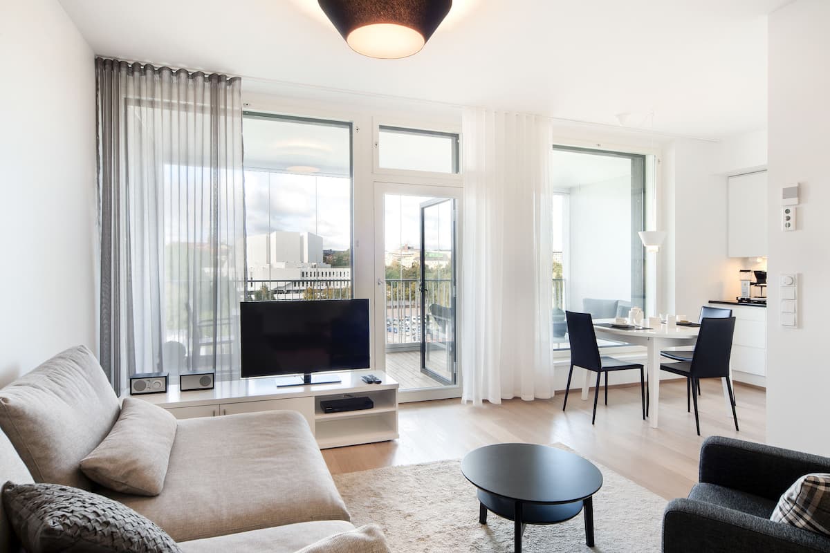 Appartement, 1 slaapkamer, balkon | 1 slaapkamer, luxe beddengoed, individueel gedecoreerd, een bureau