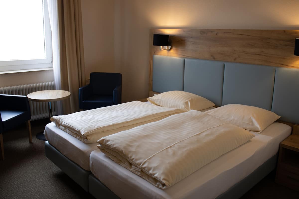 standard double room with sea view | premium bedding, in-room safe, desk, laptop workspace