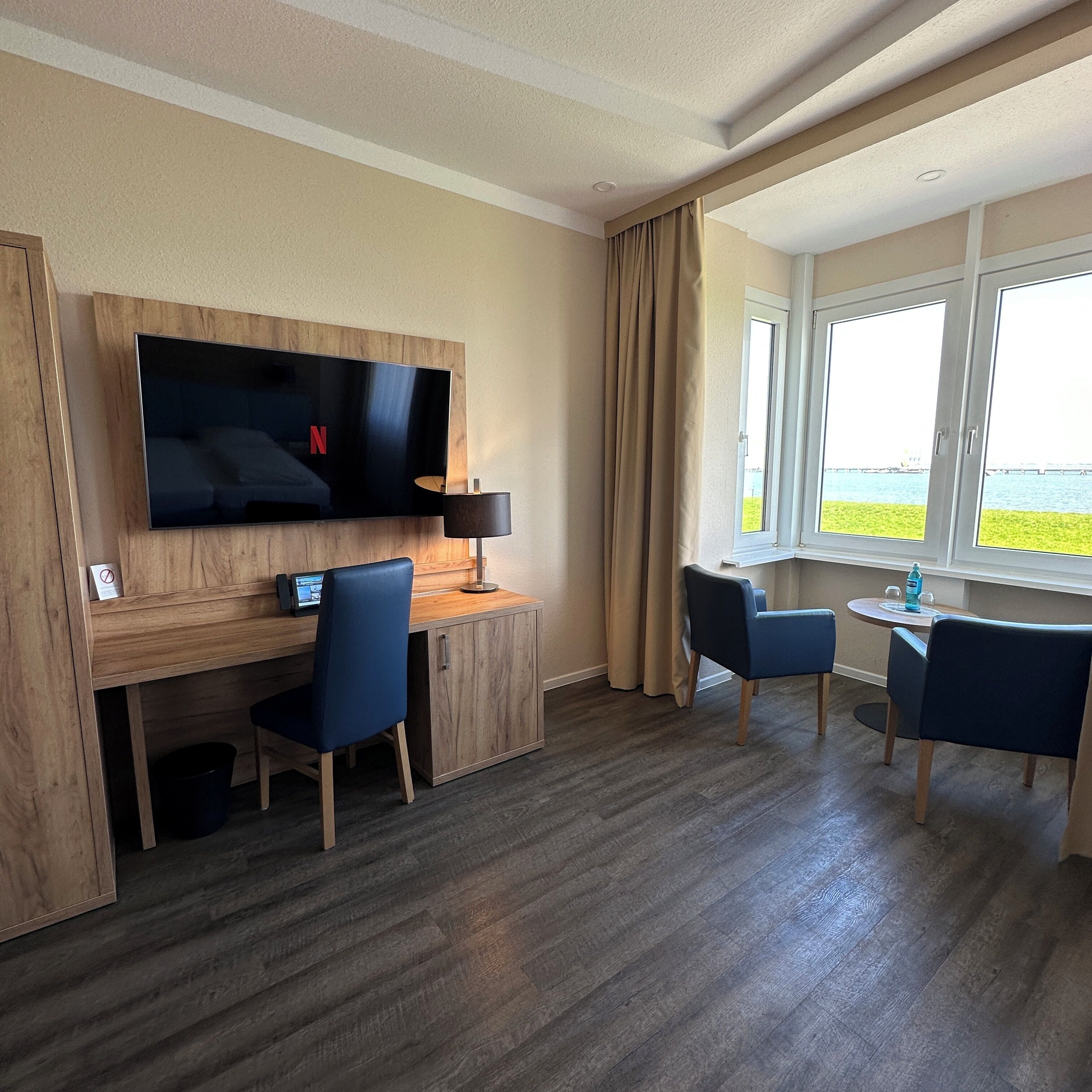 comfort double room with sea view | premium bedding, in-room safe, desk, laptop workspace