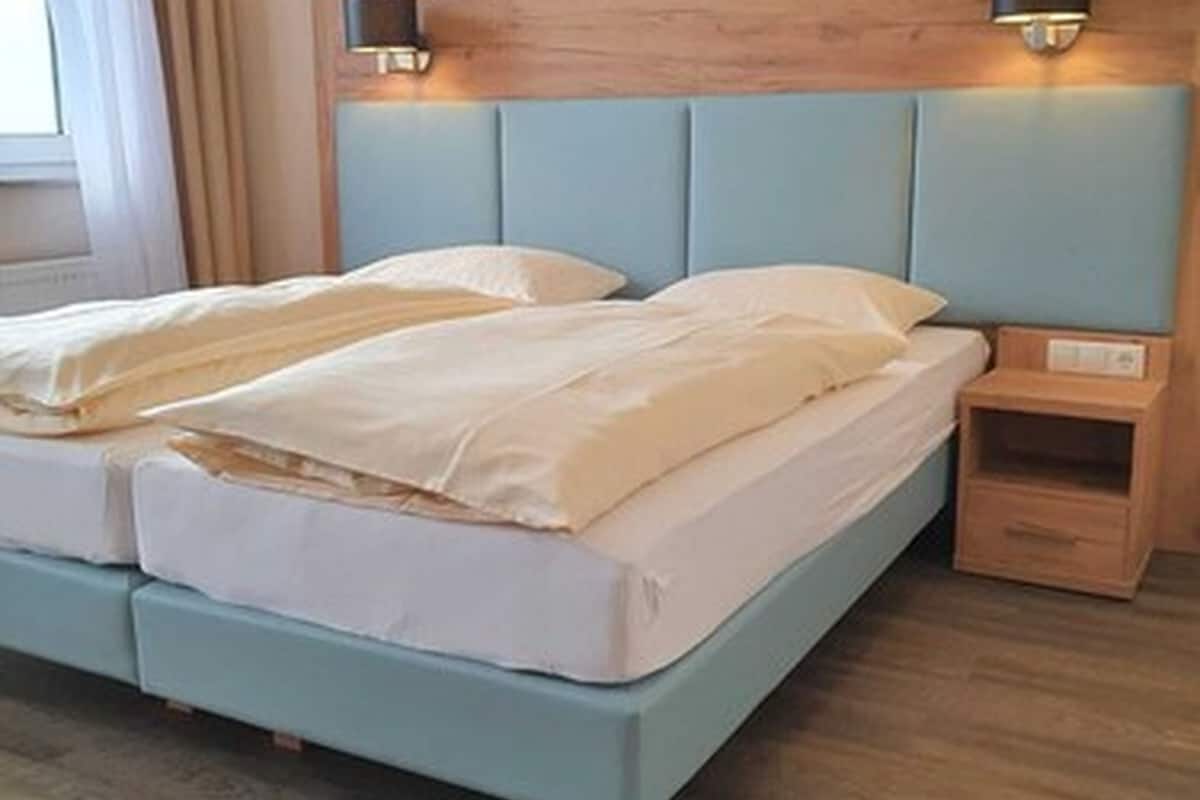 comfort double room with sea view | premium bedding, in-room safe, desk, laptop workspace