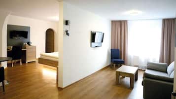 Superior Double Room | Living area | Flat-screen TV