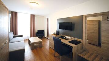 Superior-Doppelzimmer | Wohnbereich | Flachbildfernseher