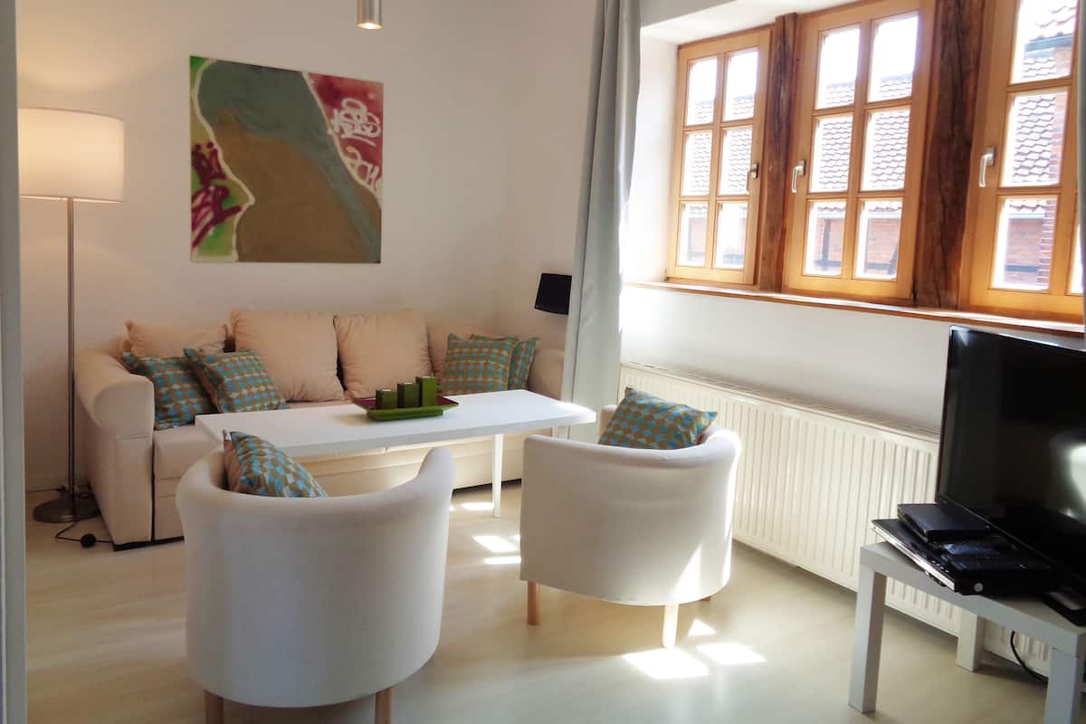 Comfort Double Room, Non Smoking | Living area | 36-inch flat-screen TV with satellite channels, TV, DVD player