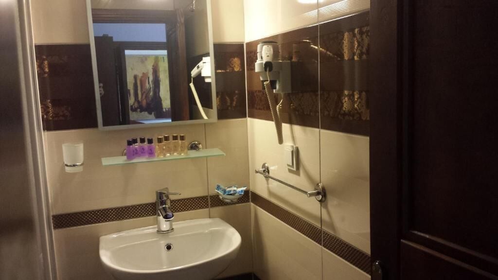 family quadruple room | bathroom | shower, free toiletries, hair dryer, slippers