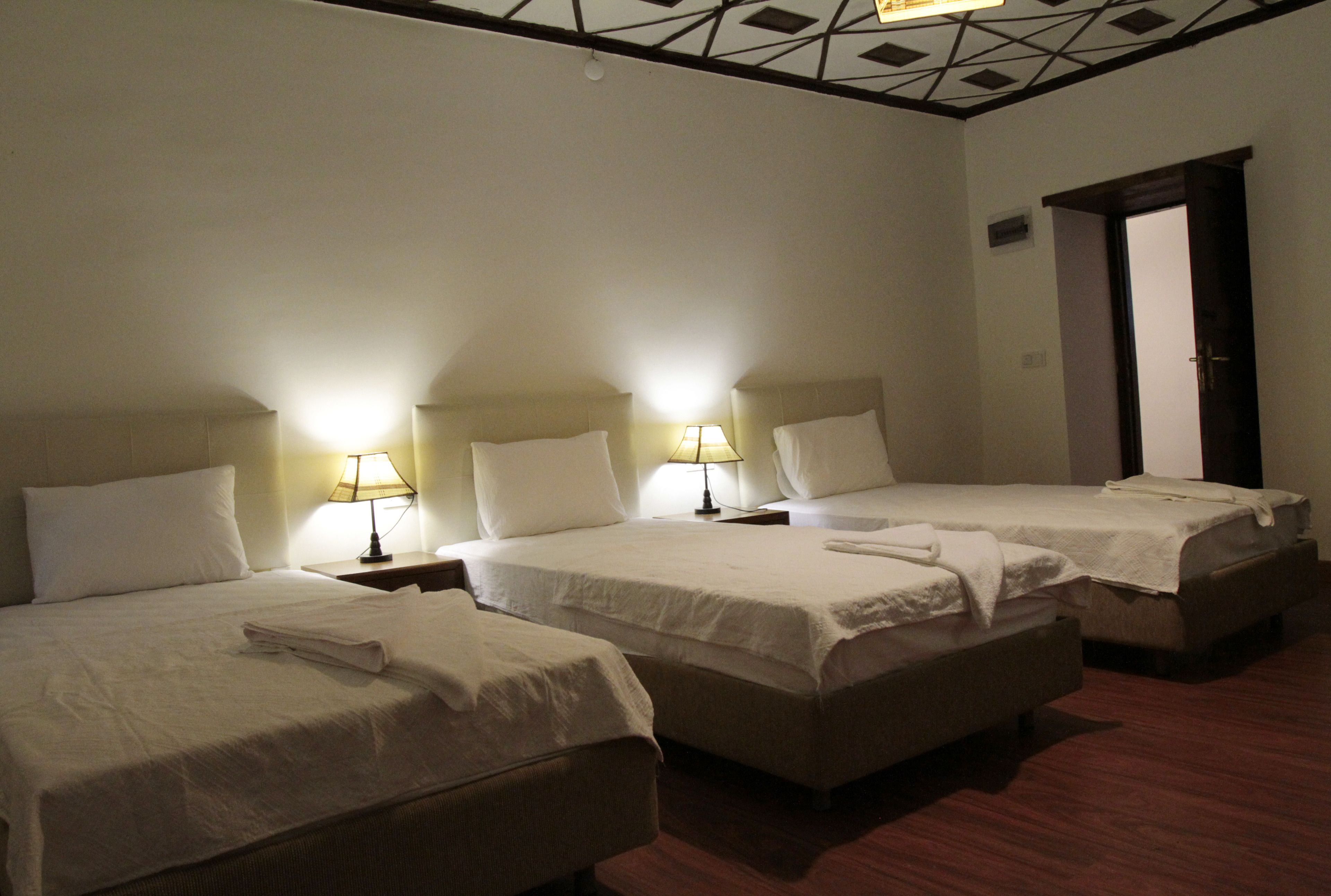 deluxe triple room | premium bedding, minibar, in-room safe, desk