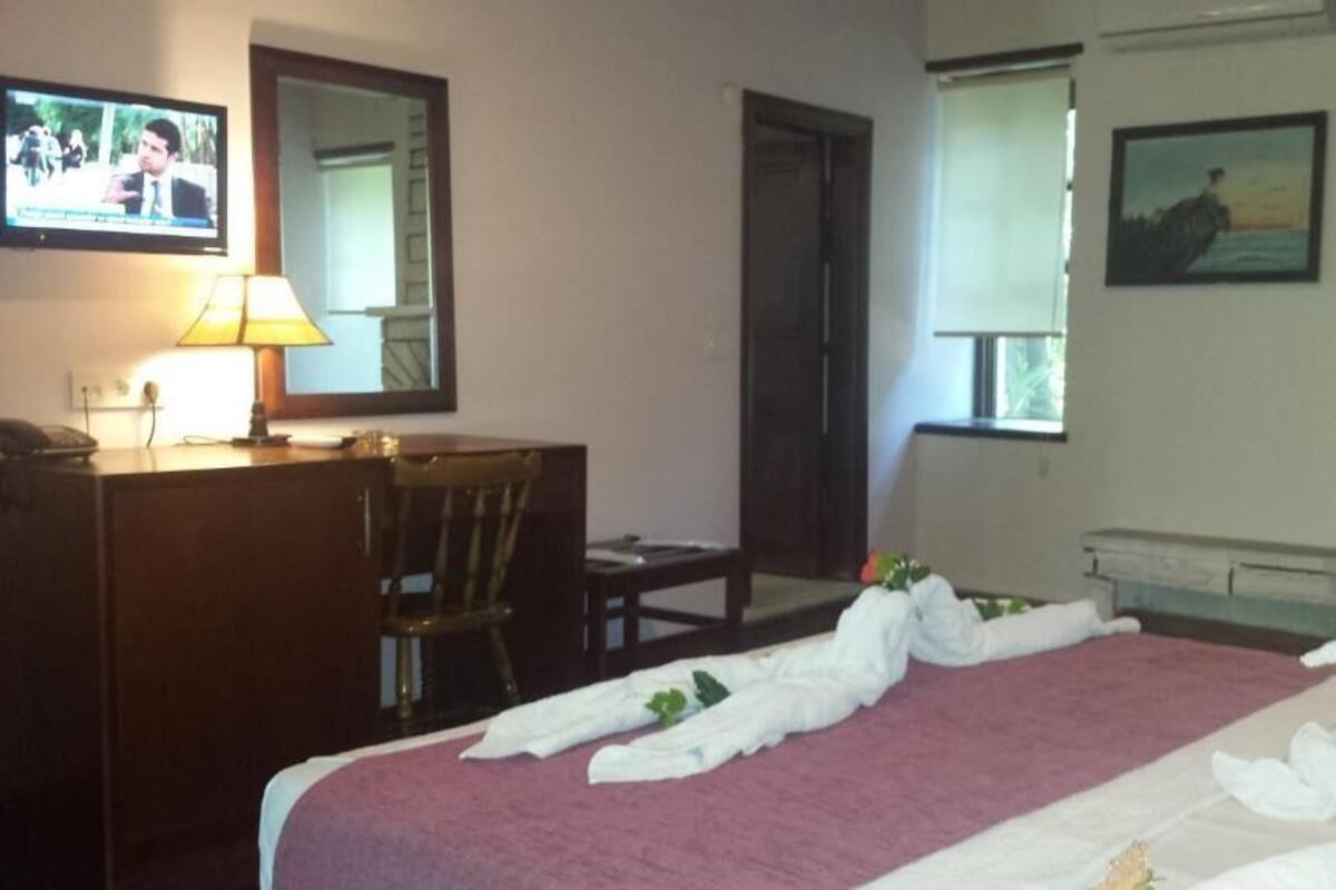 Family Room | Premium bedding, minibar, in-room safe, desk