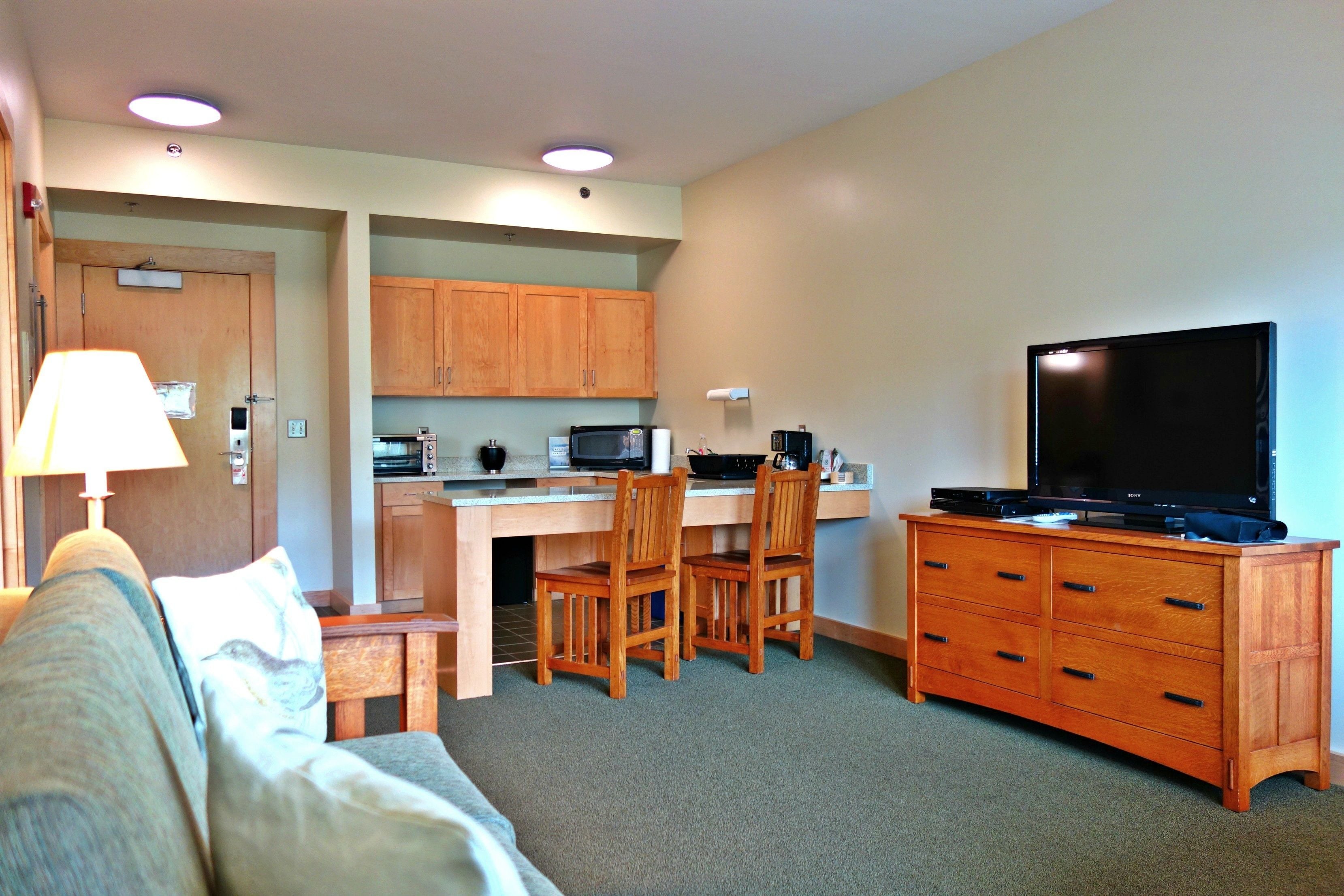 family suite, 1 bedroom, kitchenette, lakeside | living area | flat-screen tv