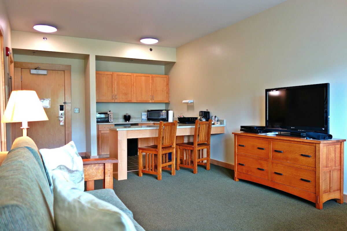 family suite, 1 bedroom, kitchenette, lakeside | living area | flat-screen tv