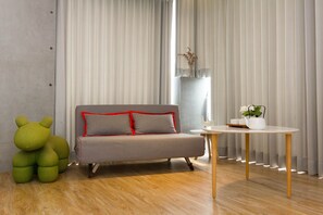 Family Room | Living room | 42-inch LCD TV with cable channels, TV, fireplace - Sunrise Bed and Breakfast (Dongshan)