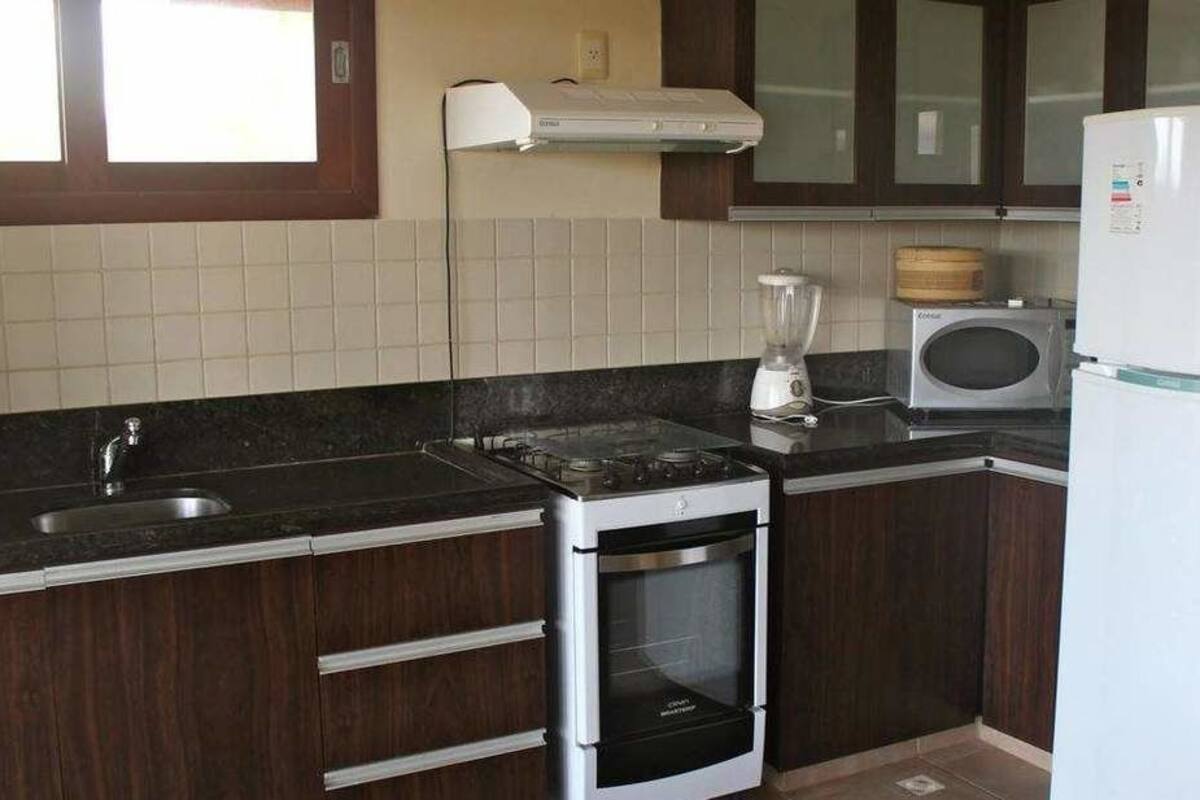 Suite, vue océan | Cuisine privée | Réfrigérateur, micro-ondes, batterie de cuisine, vaisselle et ustensiles