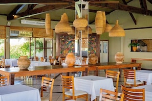 Breakfast, lunch, dinner served; Brazilian cuisine, pool views