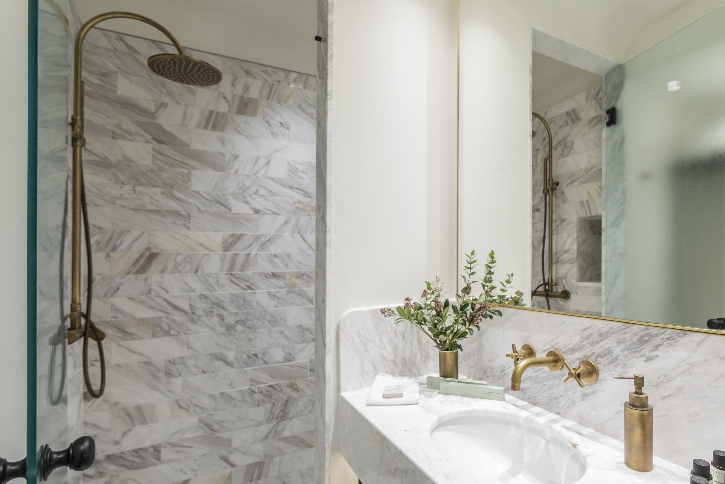 deluxe king room with balcony | bathroom | shower, free toiletries, hair dryer, bathrobes