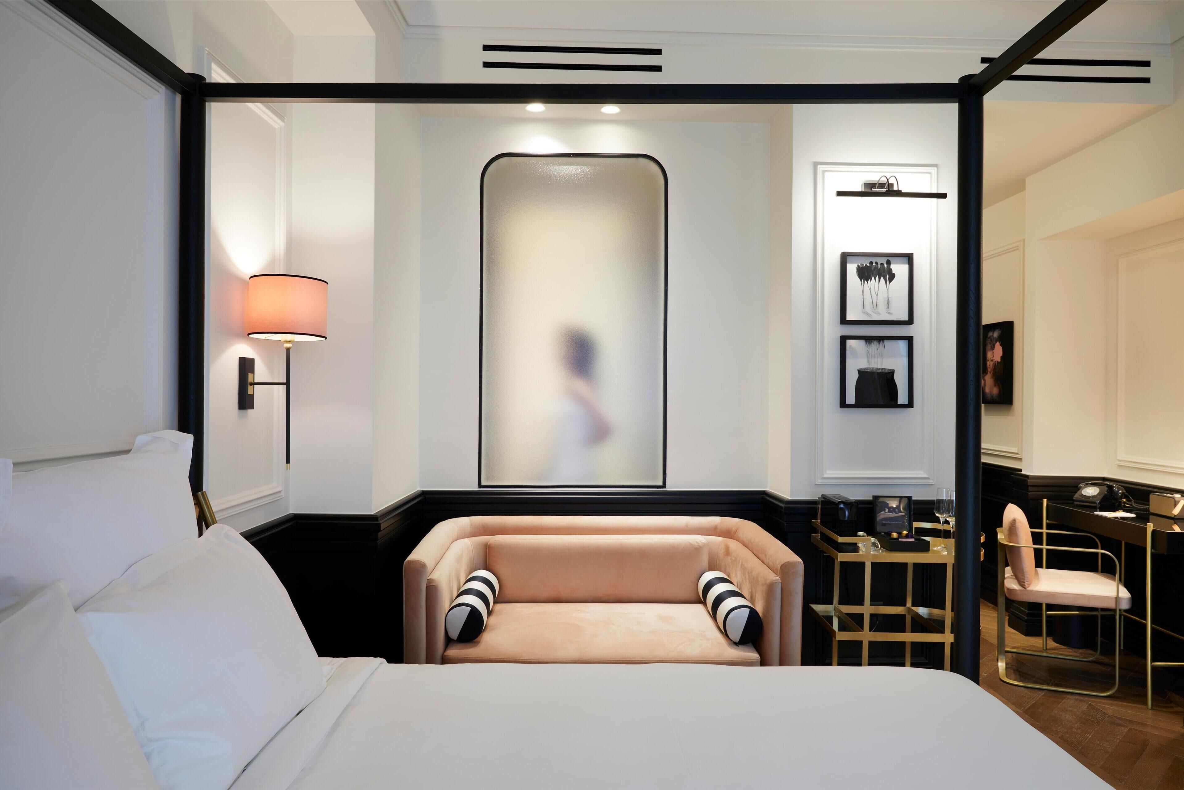 deluxe king room with balcony | premium bedding, minibar, in-room safe, individually decorated