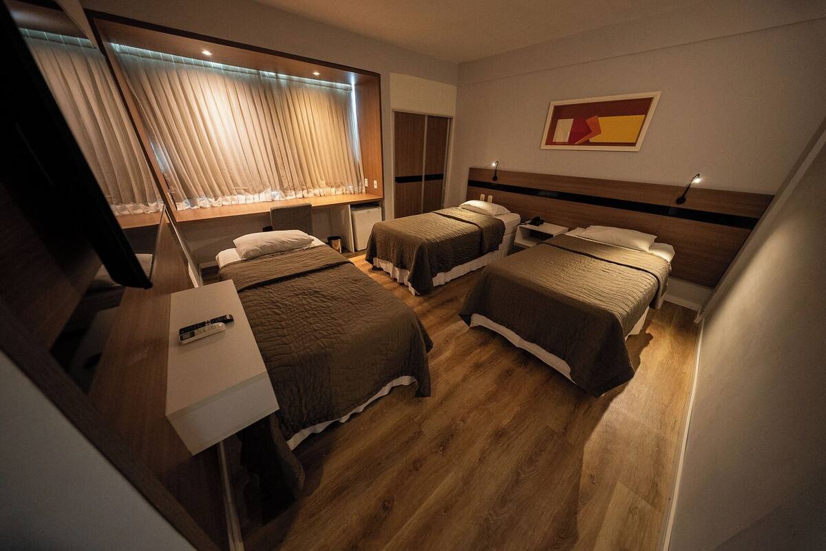 Chambre Triple Deluxe | Minibar, ameublement personnalisé, bureau