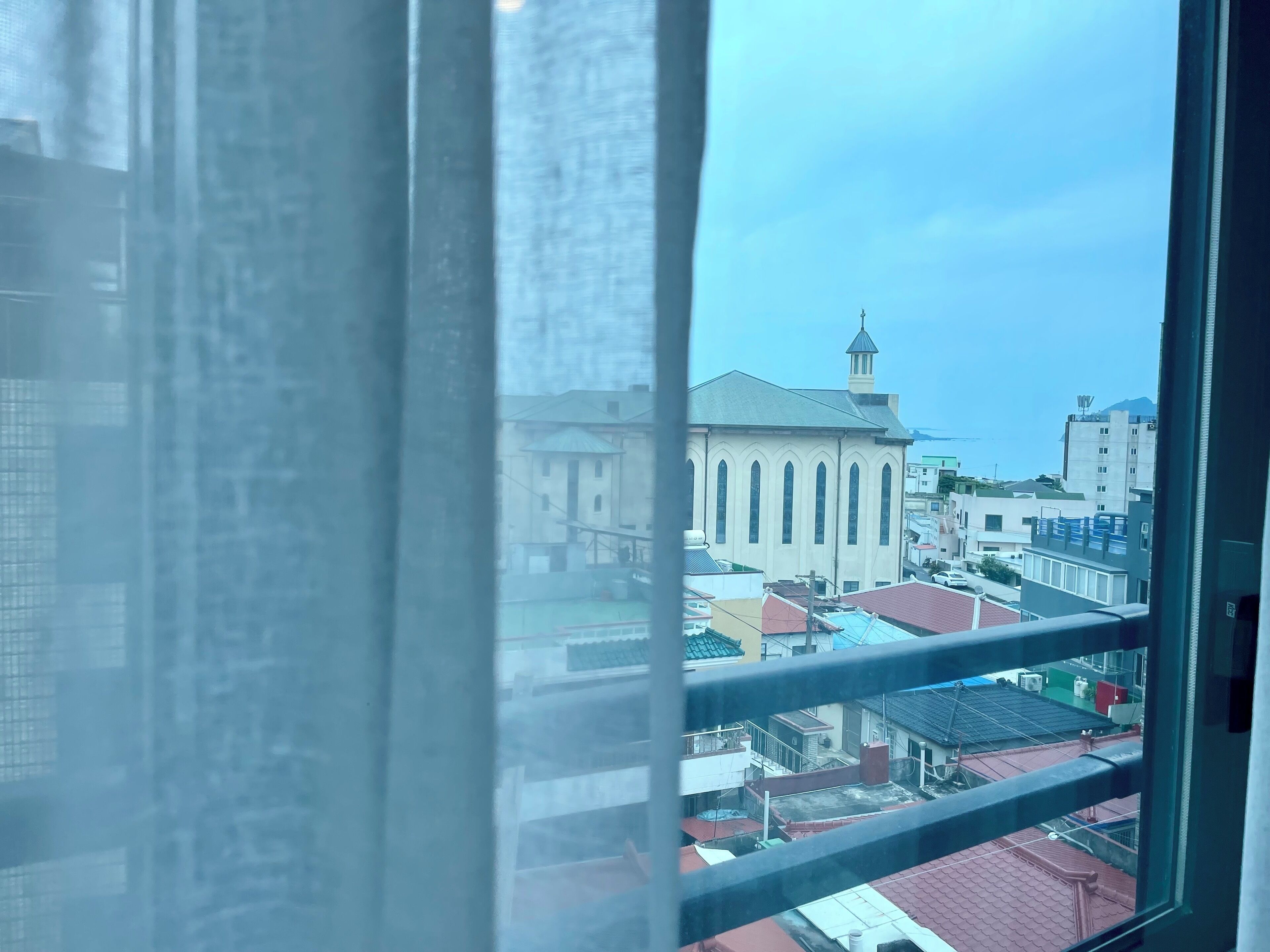 [city view] family suite, 1 bedroom (2 double beds), 1 living room, 2 bathrooms | view from room