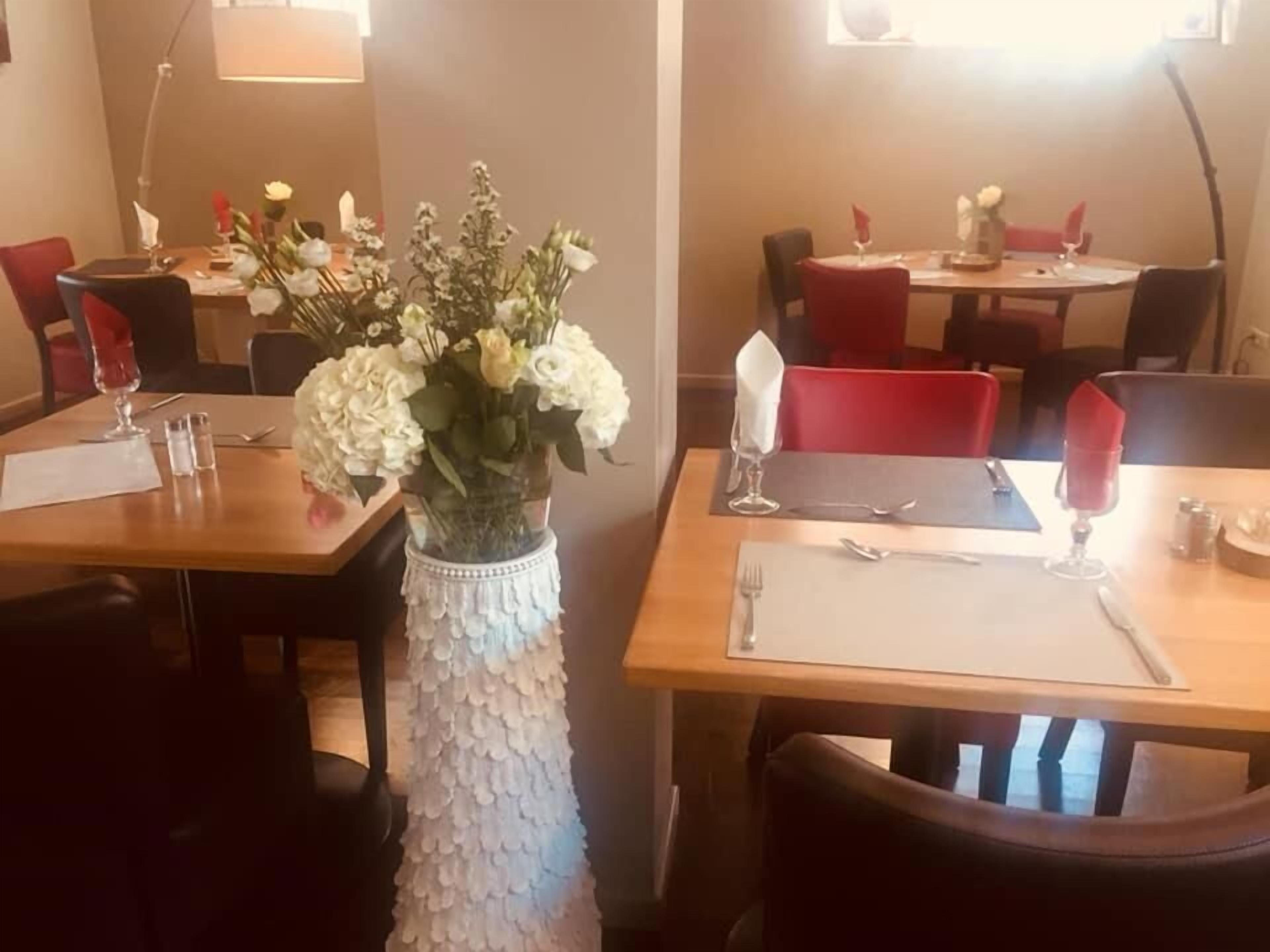 breakfast, lunch, dinner served; local cuisine