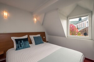 Habitación Confort doble | Escritorio, cortinas opacas, sistema de insonorización y cunas gratuitas