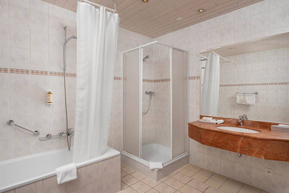 family suite | bathroom | free toiletries, hair dryer, bathrobes, slippers