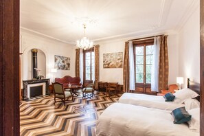 Premium bedding, desk, laptop workspace, soundproofing
