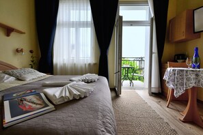 Kahden hengen standard-huone (yksi tai kaksi sänkyä) | Tallelokero huoneessa, silitysrauta/-lauta, ilmainen Wi-Fi