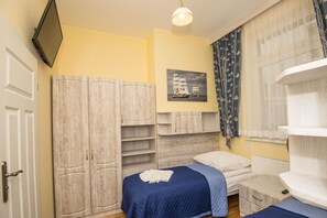 Premium Quadruple Room, 2 Bedrooms | In-room safe, iron/ironing board, free WiFi, bed sheets