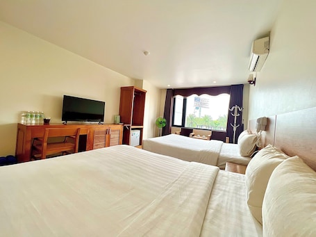 Family Room | In-room safe, desk, blackout drapes, free WiFi. Dragon Airport Hotel