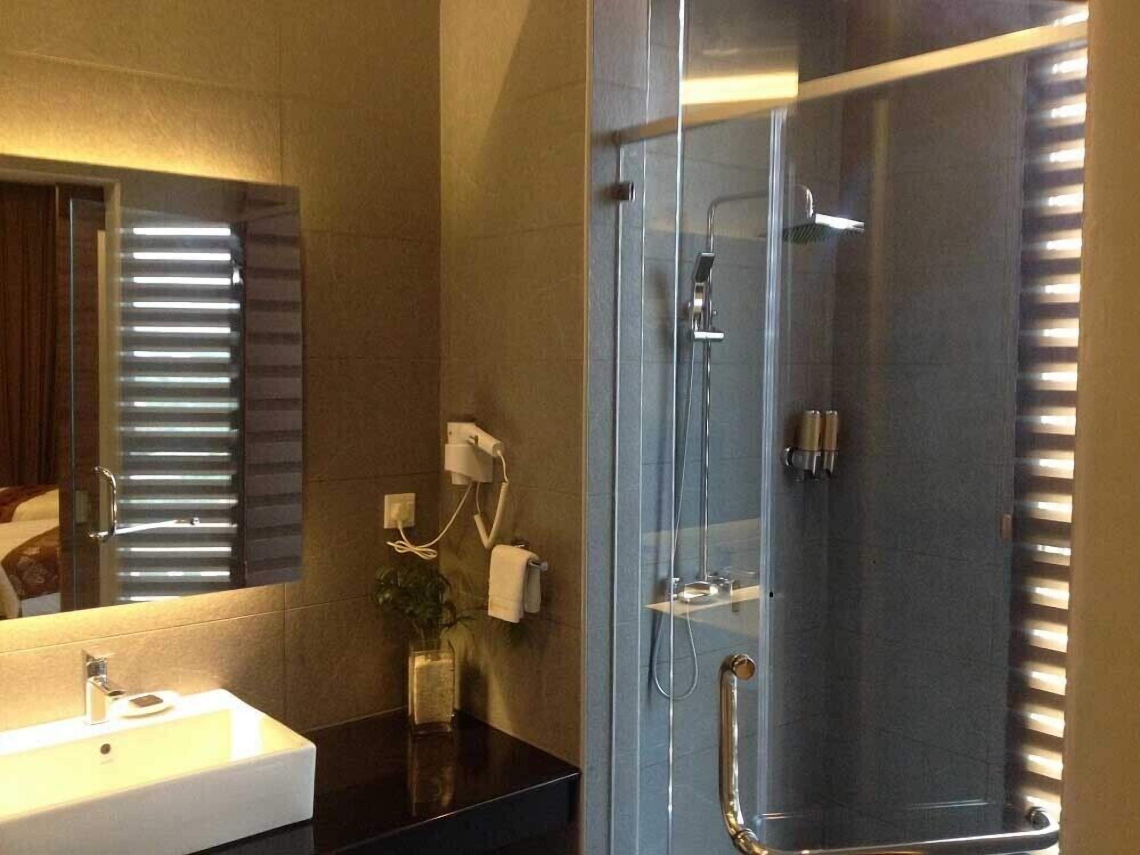 shower, free toiletries, hair dryer, slippers