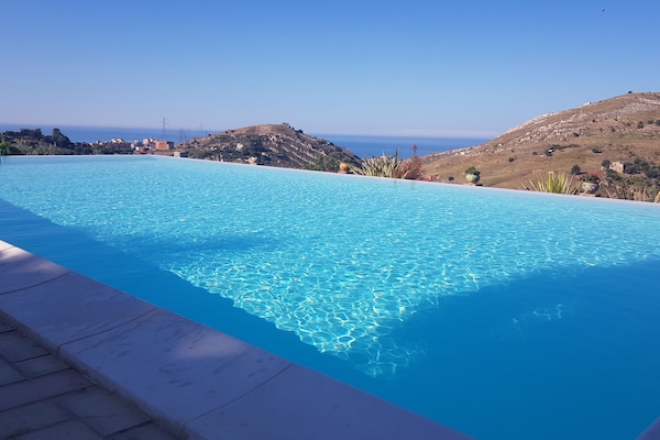 Seasonal outdoor pool, pool umbrellas, sun loungers
